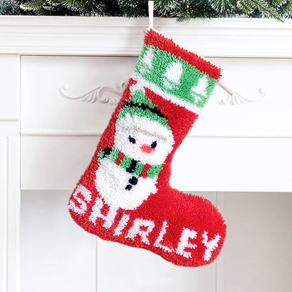 Kits de ganchillo para principiantes para hacer un calcetín navideño de muñeco de nieve