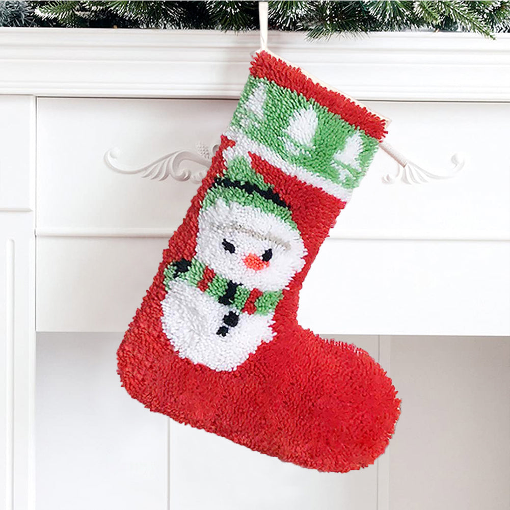 Kits de ganchillo para principiantes para hacer un calcetín navideño de muñeco de nieve